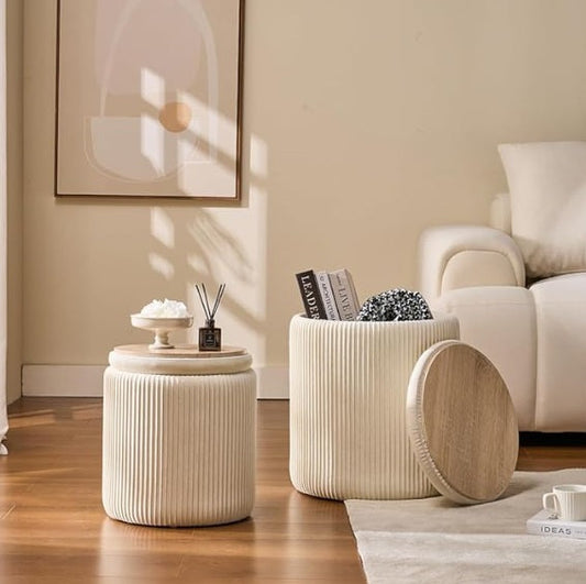 Modern storage ottoman with open hidden compartment in a small living room, showcasing space-saving multifunctional furniture design