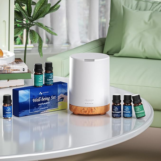 ASAKUKI Essential Oil Diffuser, Aromatherapy Cool Mist Home Humidifier with 7 LED Color Changing Light and Auto-Off Safety Switch, 6 Essential Oils Set, 300ml (Brown with Oils)