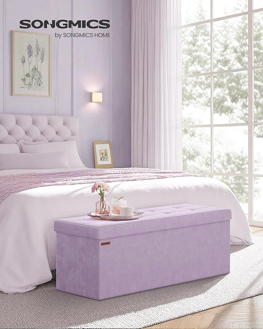 SONGMICS Mazie Collection - Storage Ottoman Bench, Foldable Foot Rest, 15 x 43 x 15 Inches, End of Bed Bench, Storage Chest, Load 660 lb, Living Room, Bedroom, Entryway, Light Lilac ULSF277P01